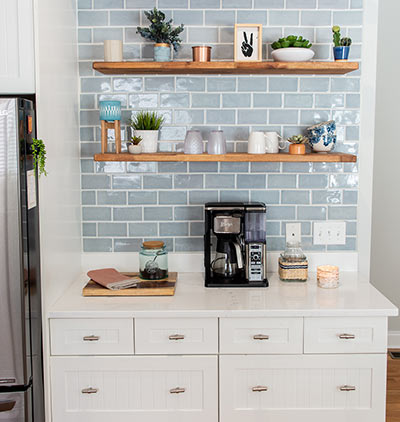 A coffee nook with a beautiful backsplash will help start your morning off right.