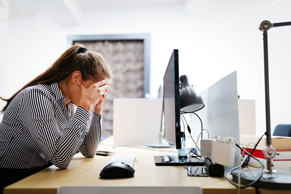 A hard-working woman trying to get through a hard day's work.