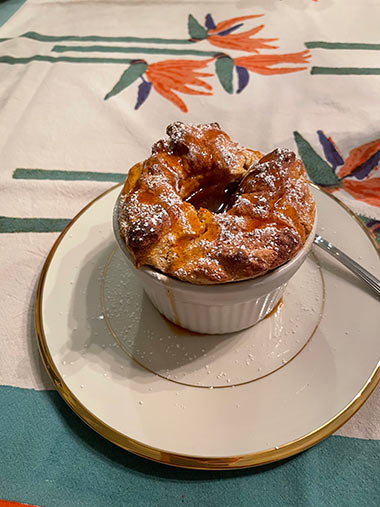 Lindsay’s souffle filled with decadent bourbon molasses sauce