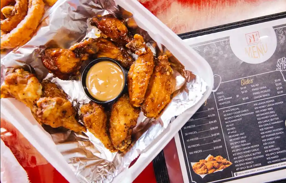Checking Wings and a menu from Not Your Average wings in Summerville, SC.