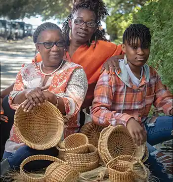 Wanda Lenhardt, Tanaisha Johnson and Za’Mauria Smith, 3 generations of Sweetgrass Basket weavers