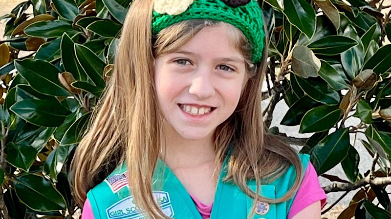 Photo of Allie Wilson in Girl Scout uniform