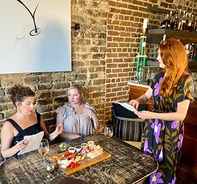 Alex Ellis and Katherine Bailess being directed by Julia Fowler.