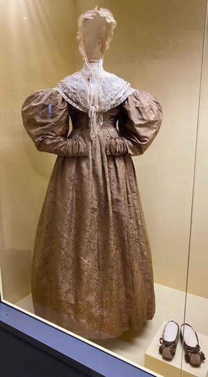 Photo of an early damask and lace dress For a Southern Belle.