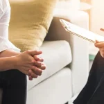 A patient with a doctor getting a consultation.