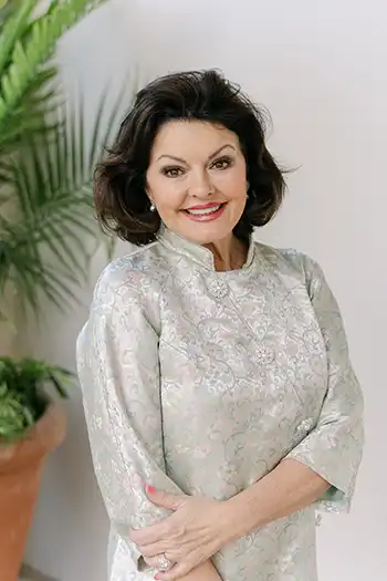 Kim Lolley of Kim Lolley Designs poses with a smile