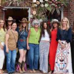 Ladies pose in front of Louise of Summerville