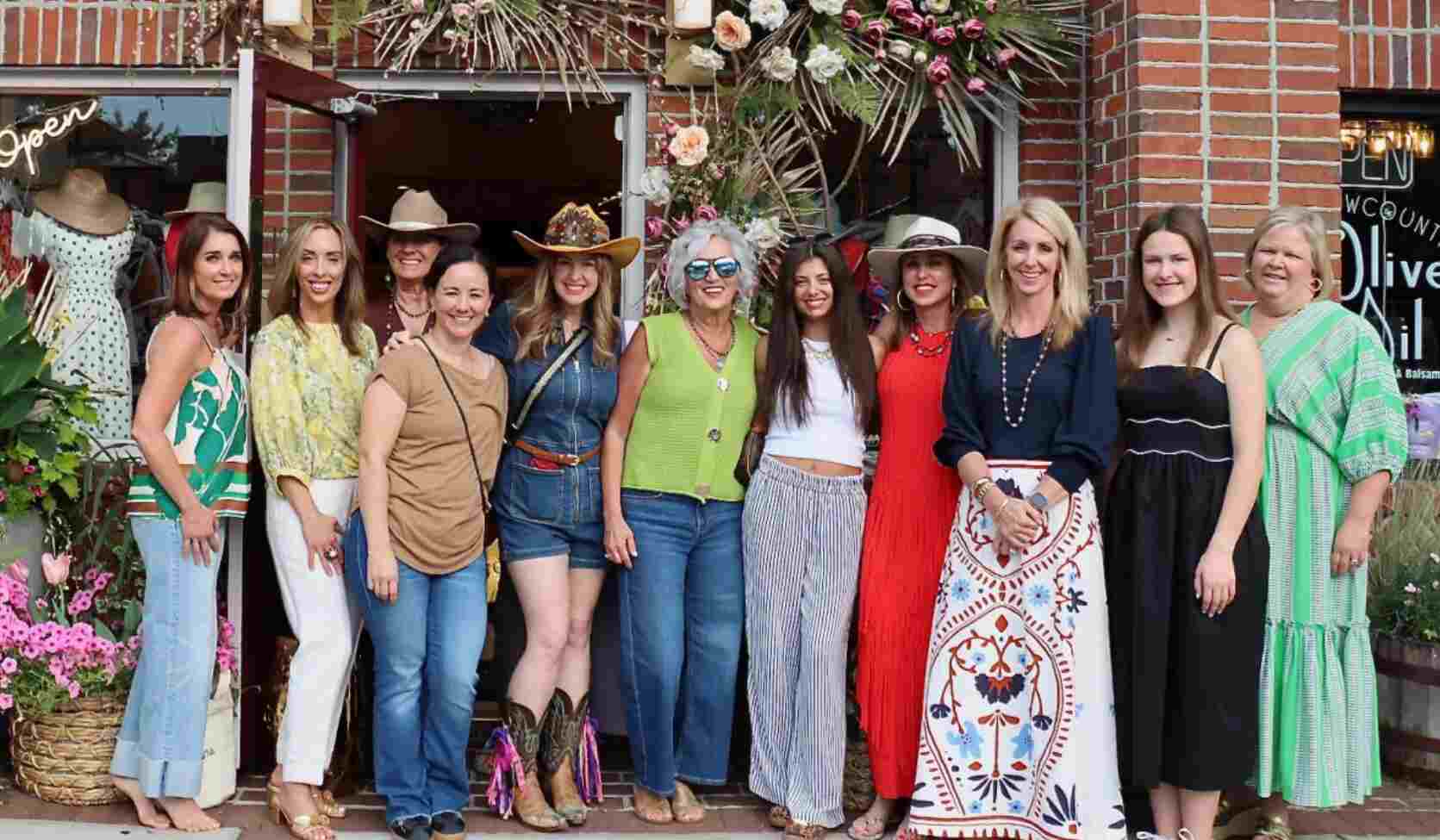 Ladies pose in front of Louise of Summerville