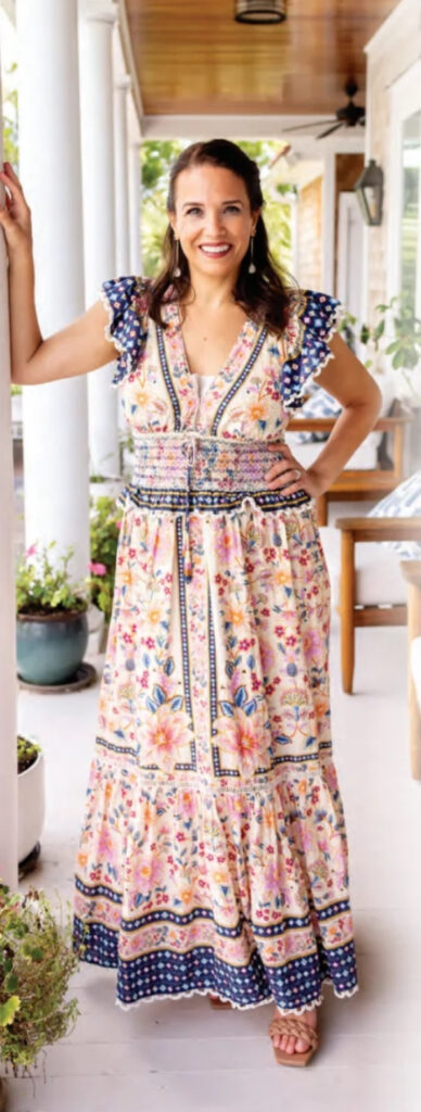 Leslie Norton wears a dress by A Farm Rio.