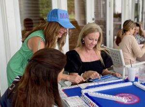 This imagine displays women playing mahjong at The Happy Southerner