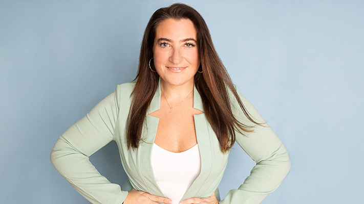 This image displays a picture of a woman, Kim Russo