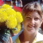 Women’s tennis legend Chris Evert after winning a tournament poses with a bouquet of flowers. Photo Provided by Charleston Tennis LLC.