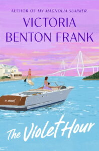 Book cover for The Violet Hour by Victoria Benton Frank. An illustrated coastal scene shows a woman relaxing on a white motorboat in bright blue water, while another person paddleboards nearby. A cable-stayed bridge stretches across the background beneath a pink and purple sunset sky, with waterfront homes along the shoreline. The title, The Violet Hour, appears in large white script at the bottom, and the cover notes the author of My Magnolia Summer.